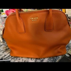 Gorgeous Prada bag with three large zippered compartment